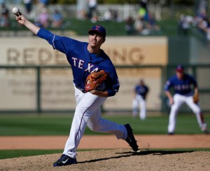 Texas Rangers pitcher Alex Gonzalez pitches in the eighth inning during a Major League Baseball spring training game against the Kansas City Royals at Surprise Stadium in Surprise, Arizona Wednesday March 4, 2015. The Royals beat the Rangers 13-2. (Andy Jacobsohn/The Dallas Morning News) 03102015xSPORTS